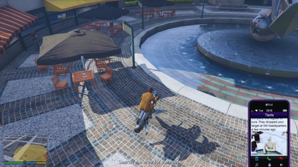The GTA Online Protagonist opening a text message while riding the Oppressor Mk II at the Fountain Plaza.