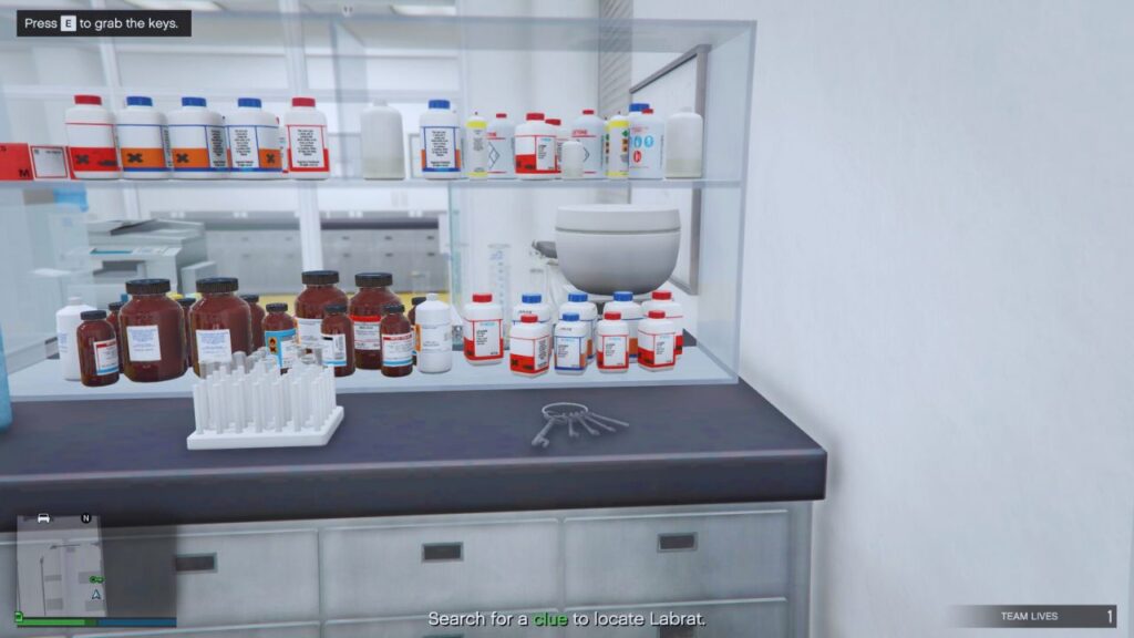 A ring of keys near several medications and test tubes.